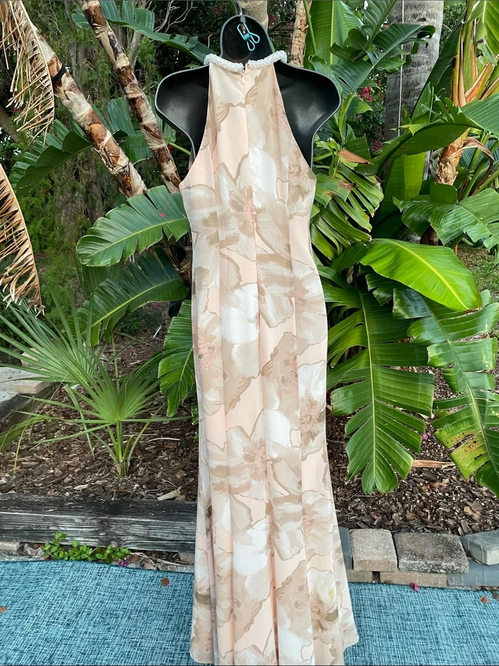 beaded collar, soft floral gretchen style gown by Calvin Klein